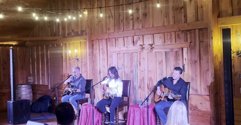 Lee Thomas Miller and The Warren Brothers performing an acoustic songwriters round for a private YPO event in Sedalia, Colorado